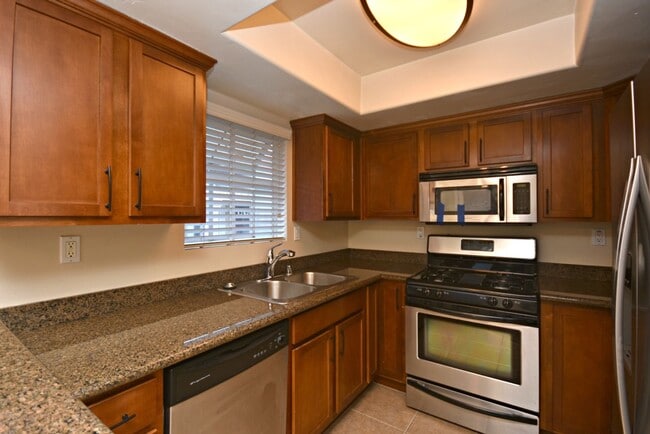 Building Photo - Great Upstairs  2BD Condo with washer/drye...