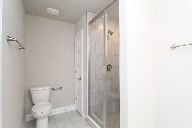 Building Photo - Spacious 3-Bed, 2.5-Bath Townhome Steps from Blue Wahoos Stadium & Palafox Street with Upgraded K...