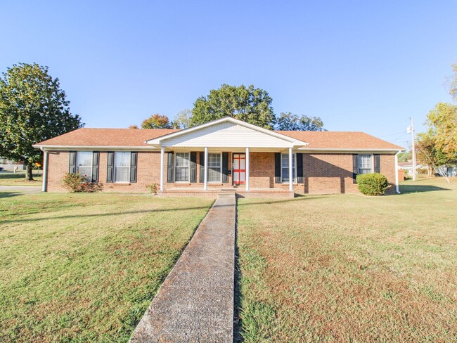 Primary Photo - Well maintained brick home on a nice corne...