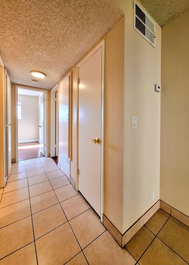 Building Photo - Beautifully Remodeled Second Floor Condo A...