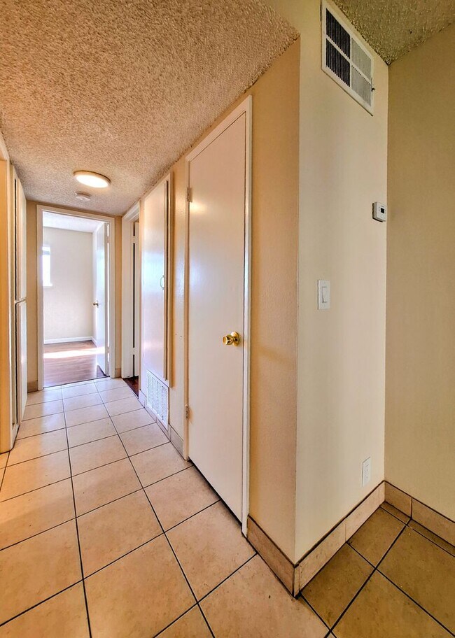 Building Photo - Beautifully Remodeled Second Floor Condo Across From Pool