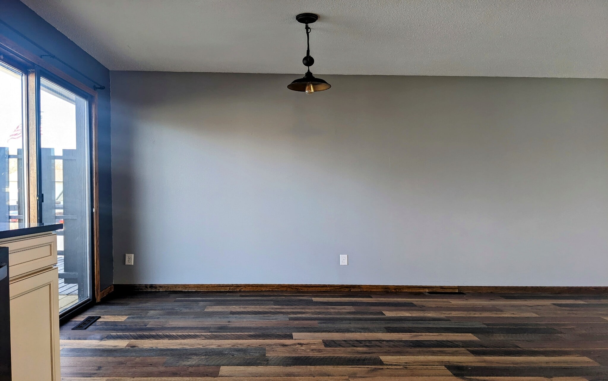 Dining room with sliding door for deck and backyard access - 2114 Laforest Ave