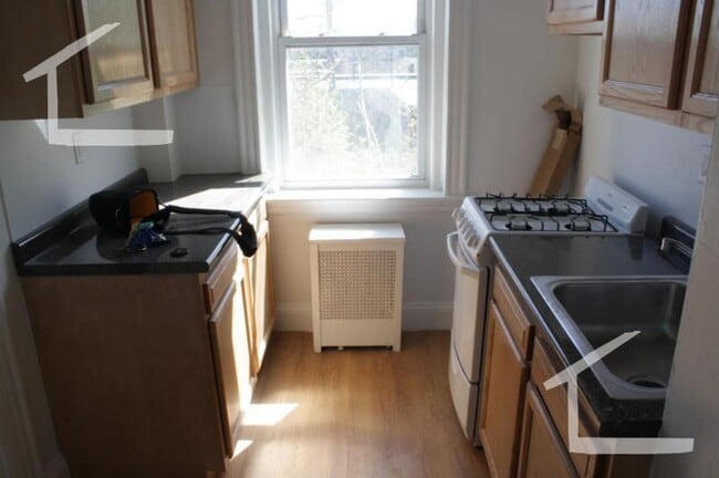 Building Photo - No Brokers Fee, No Security Deposit, heat, Hot Water Included, Laundry on a Site, Parking
