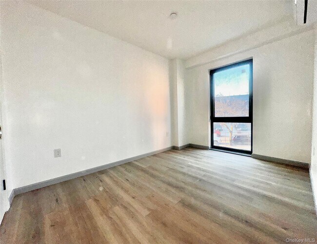 Building Photo - 70-25 Queens Blvd