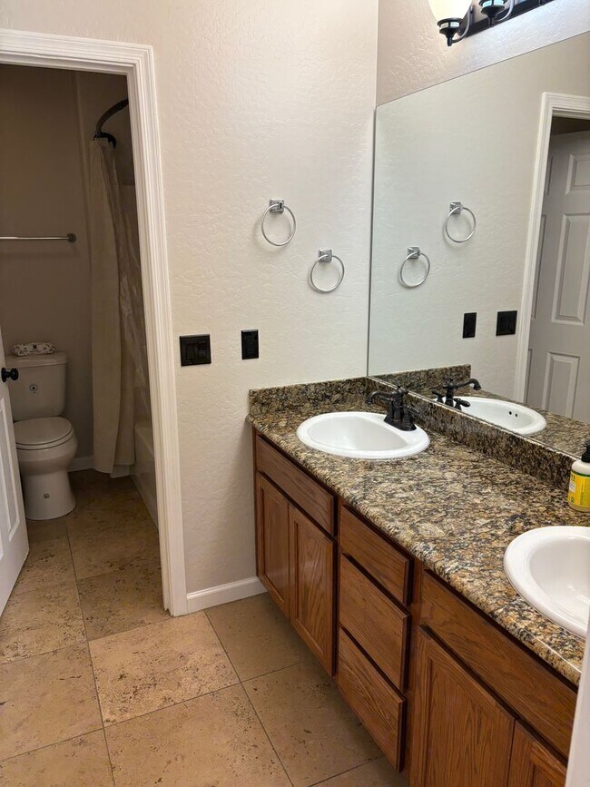 Building Photo - Furnished, 1-Year Long-Term Rental