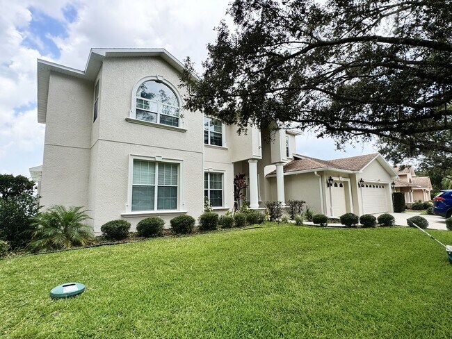 Building Photo - St. Cloud 4 Bedroom, 4 Bathroom Pool Home with Lake View