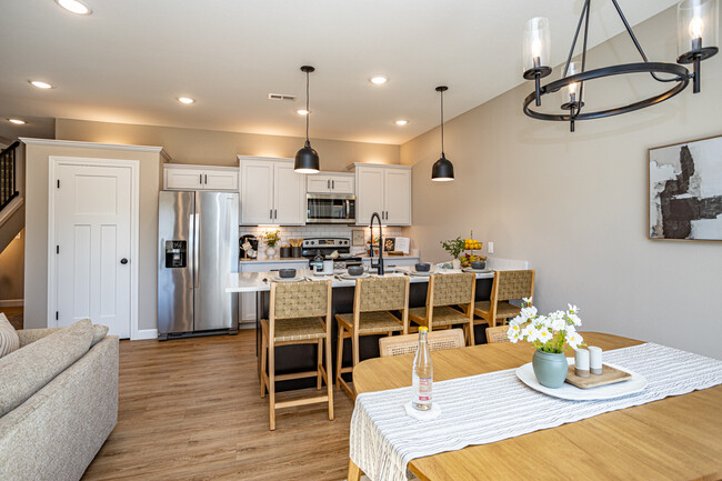 Kitchen feat. stainless steel appliances and quartz countertops, offering style and functionality - 110 Sierra Cir