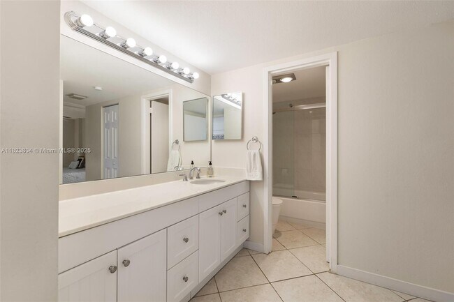 Building Photo - 3375 N Country Club Dr