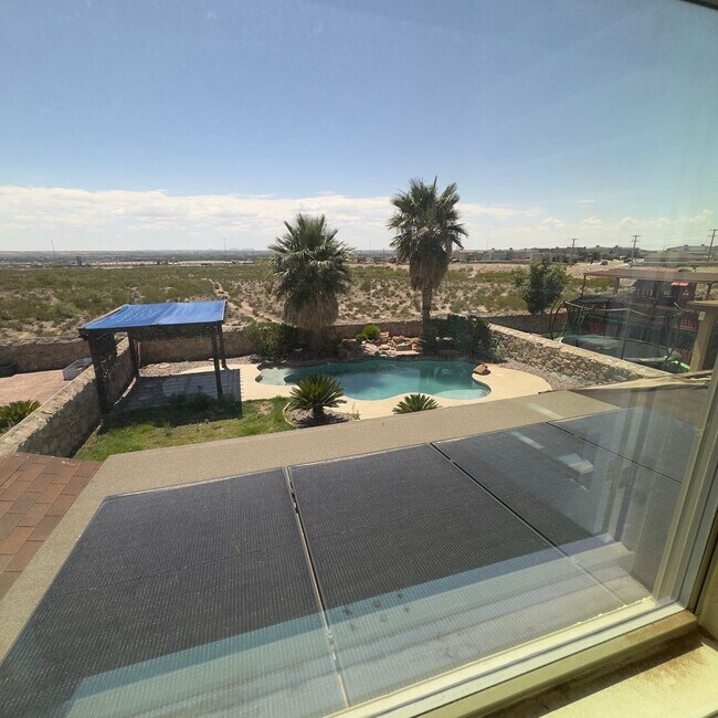 Building Photo - 4 Bedrooms, 3 Baths, a Pool, and Solar Panels!