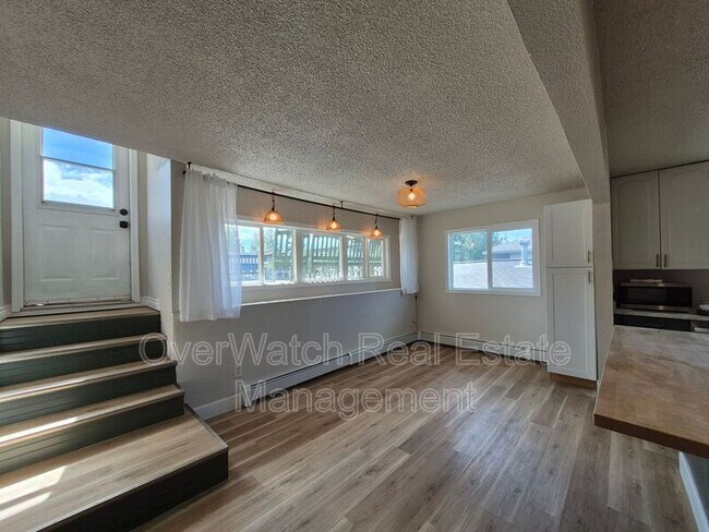 Building Photo - 8331 E 6th Ave