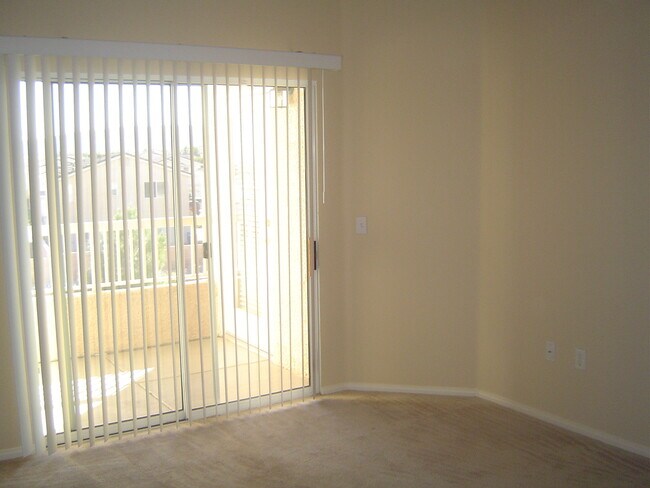 Building Photo - Move-In Ready Condo with Private Balcony & Modern Upgrades