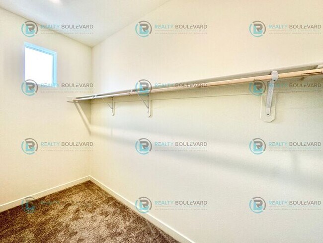 Building Photo - Modern 2 Bedroom 2Bath Townhome with Dual Patios & Designer Finishes near Truckee River