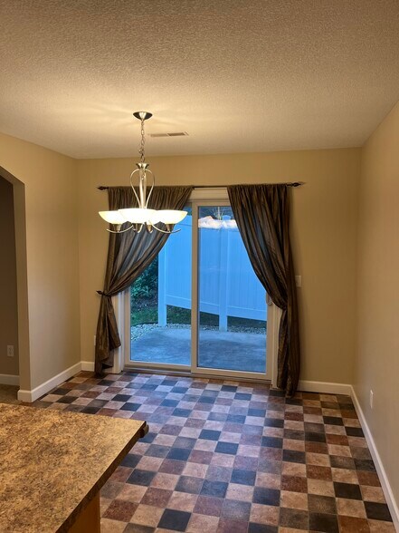 Dining and back patio - 1736 Bennett St