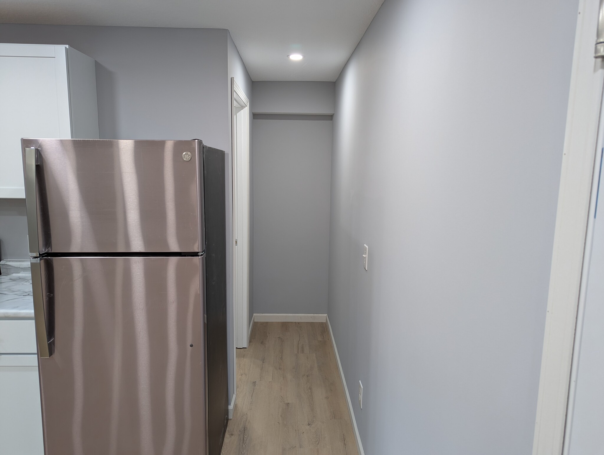 bathroom hallway and small storage area - 203 3rd St E