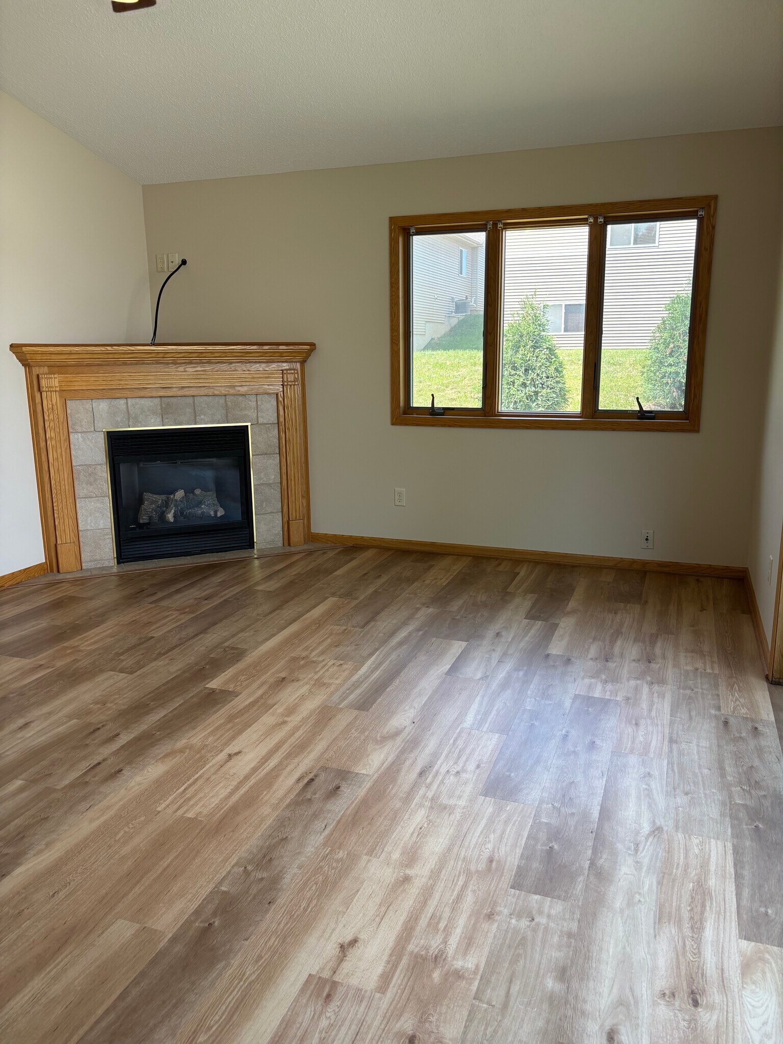 Living room with gas fireplace - 309 Evergreen Dr