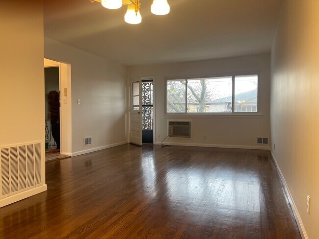 front of living room with balcony access - 2717 E 65th St
