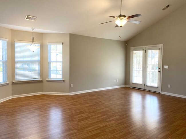 Building Photo - NEWLY UPDATED TWO BEDROOM HOME IN GATED IR...