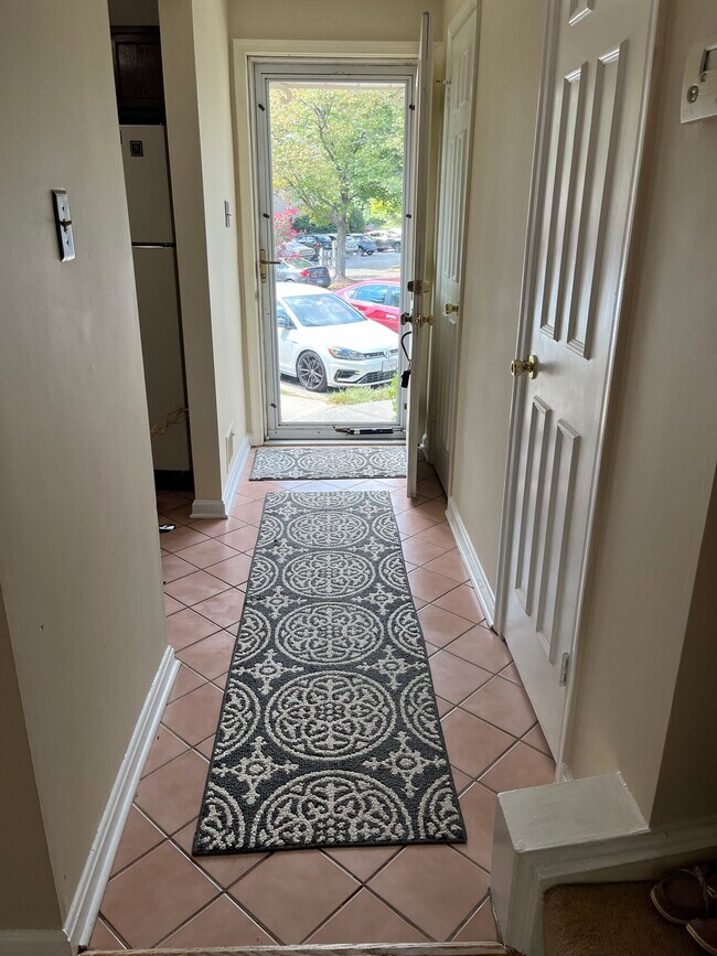 Parking space (red car) steps from townhouse - 11251 Silentwood Ln