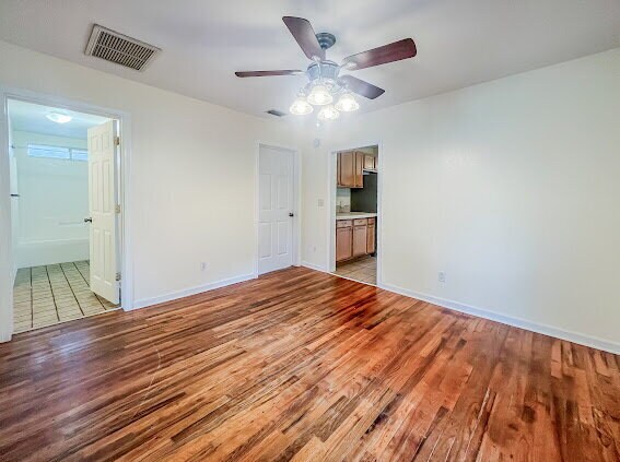 Building Photo - "Charming MIDTOWN 2-Bedroom Home with Glea...
