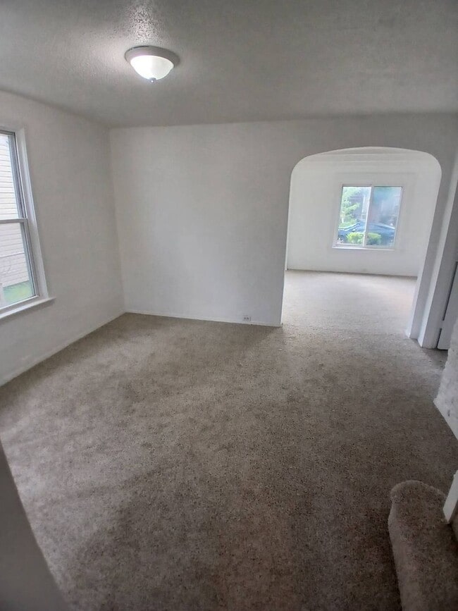 Building Photo - Newly Renovated 4BR/1BA Single-Family Home with Garage – Cleveland