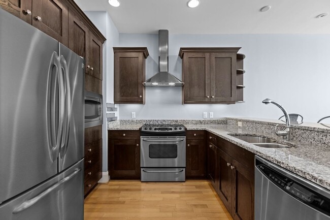 Building Photo - Modern 1-Bedroom with Downtown Raleigh Skyline Views