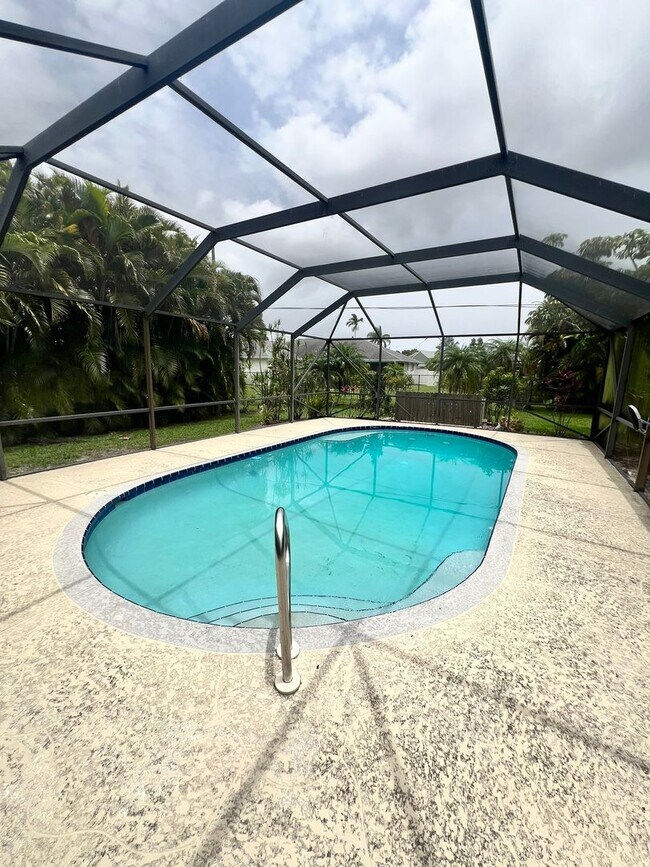 Building Photo - BEAUTIFUL 3 BEDROOM POOL HOME IN SANDPIPER...