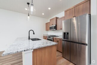 Building Photo - Row Home with 1 car garage 2 bed, 2.5 bath