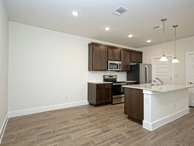 Building Photo - "Charming 3-Bedroom Condo Retreat in Georg...