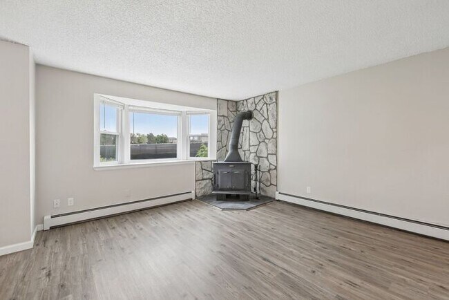 Building Photo - Townhome-Style Living with Greenbelt Views, Attached Garage & Community Pool!