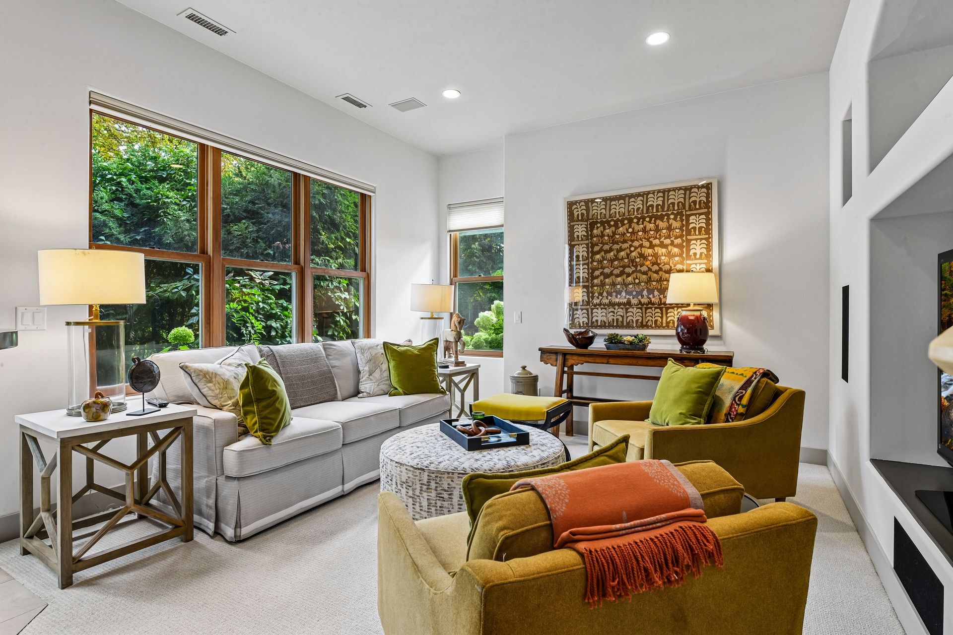 The lower level offers entertaining space, a wet bar, exercise room, and access to the walkout patio - 745 Rice St E