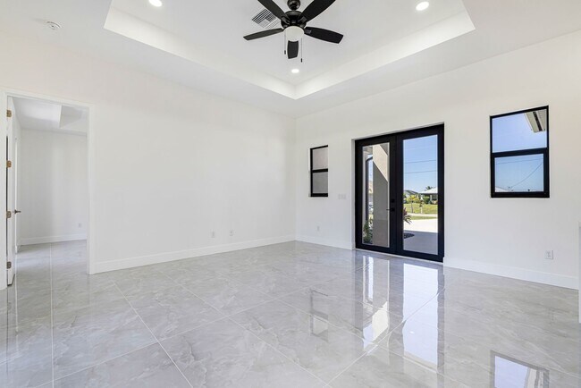 Building Photo - Brand-New Coastal Retreat | 4BR Home in NW Cape Coral