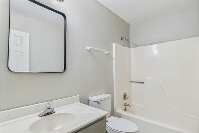 Building Photo - UNCG Area – Chancellors Court Townhomes. Walk to Campus and just minutes to Downtown!