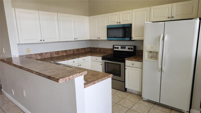 Building Photo - 12813 SW 132nd Terrace