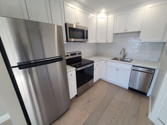 Building Photo - Newly Renovated - Ocean Views - Laundry - ...