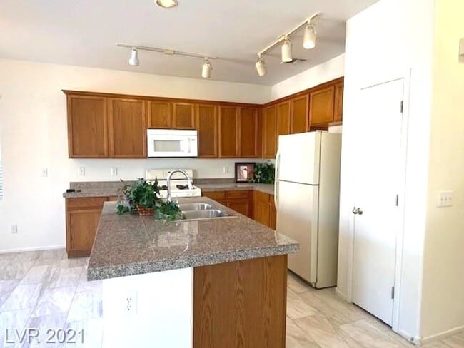 Building Photo - Gated Community! Fabulous 4 Bedrooms Plus Large Loft. One Bed and Bath Downstairs.