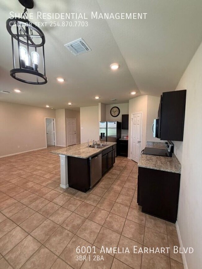 Building Photo - 6001 Amelia Earhart Blvd