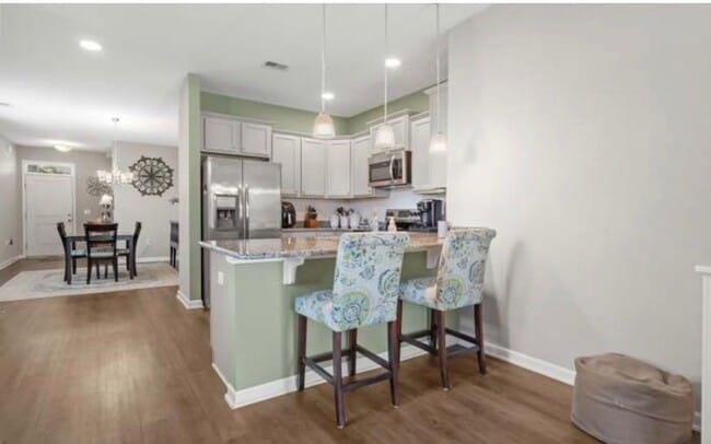 Building Photo - Enjoy Carolina Living: 3BR Home in The Farm w/ Outdoor Living Upgrades