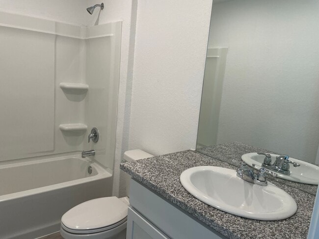 Building Photo - Spacious 4-Bedroom Home with Huge Backyard...