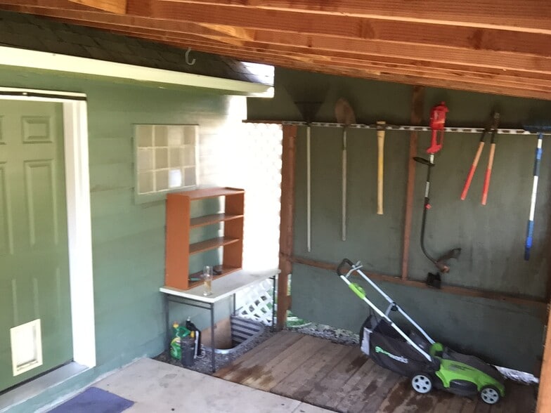 In the backyard there is a covered patio to keep you dry during the rainy months in Oregon. - 1185 6th Street Northwest