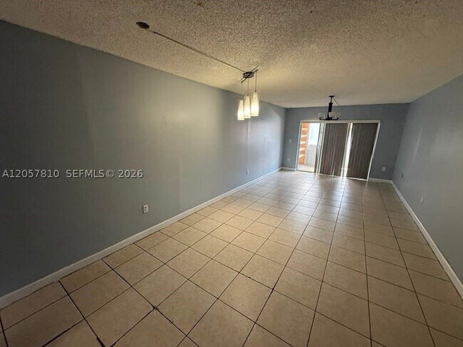 Building Photo - 6095 W 18th Ave