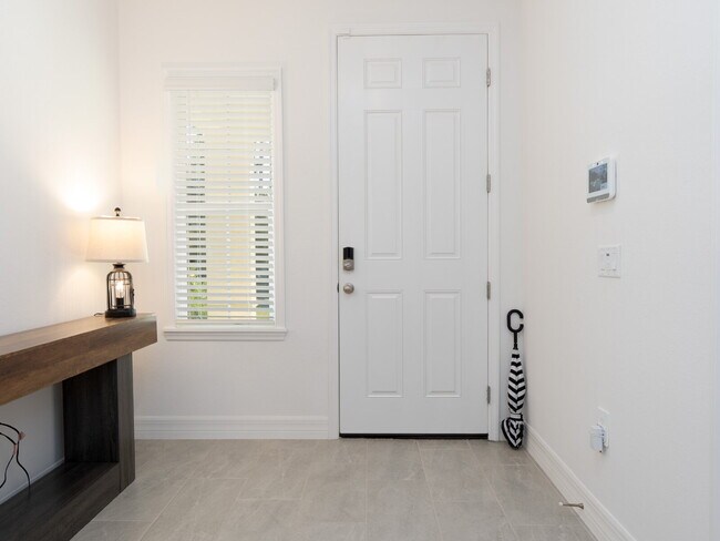 Building Photo - Move in now with zero deposit! This stunni...