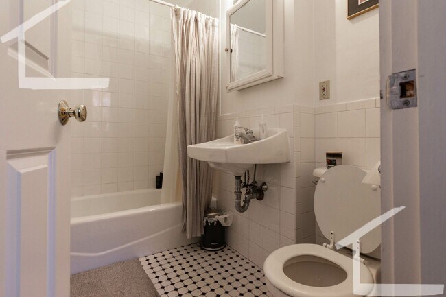 Building Photo - No Brokers Fee, No Security Deposit, Garden Level Unit, heat, Hot Water Included, Laundry on a Site