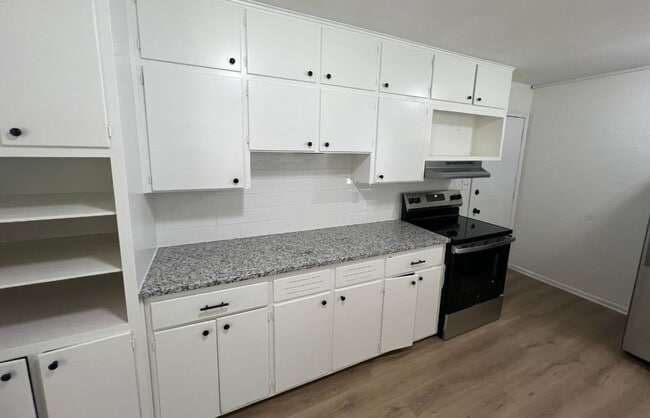 Building Photo - Spacious 4-Bedroom Home with Finished Base...