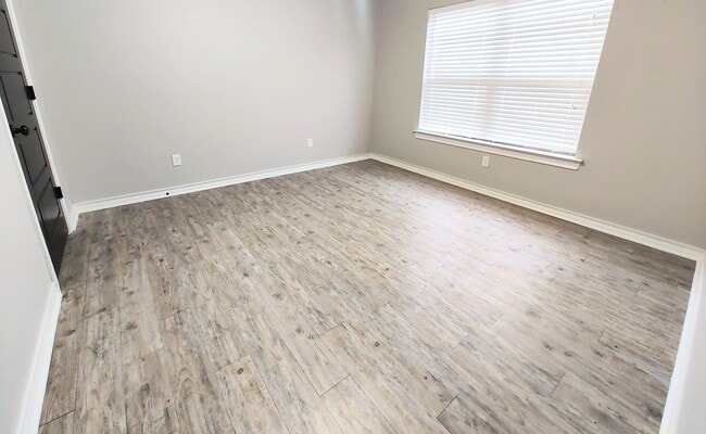 Building Photo - AUGUST PRE-LEASE! Modern 3-Bedroom Apartment with 2-Car Garage – Recently Constructed in Lubbock,...