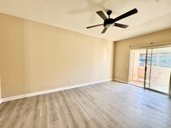 Building Photo - DOWNSTAIRS CONDO | GATED COMMUNITY | CENTENNIAL HILLS | UPDATED 3 BEDROOM