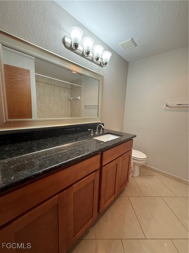 Building Photo - 8555 Bernwood Cove Loop