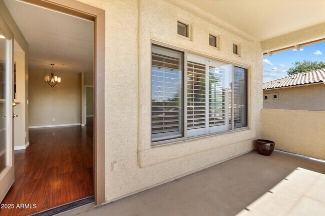Building Photo - 9100 E Raintree Dr