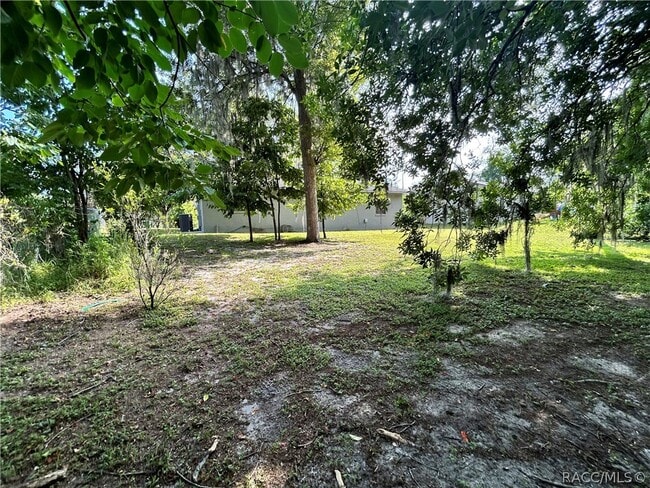 Building Photo - 7236 E Oak Isle Dr