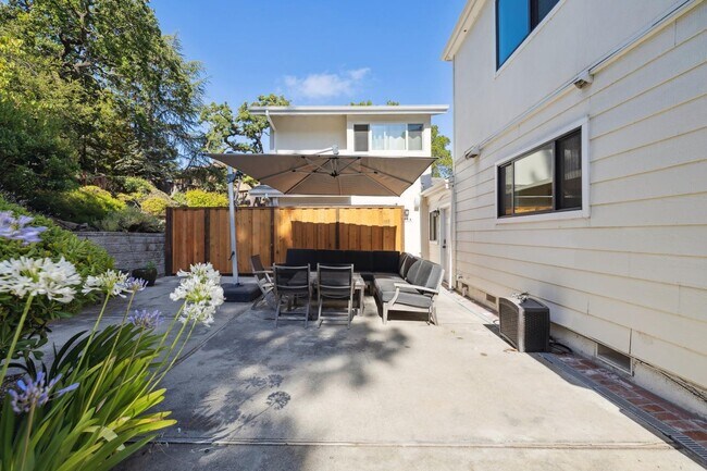 Building Photo - Elegant Two-Story Home with Backyard Oasis...