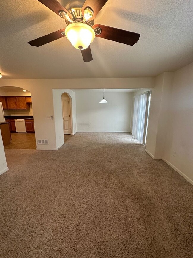 Building Photo - 3 BEDROOM, 2.5 BATHROOM TWINHOME WITH 2 CAR ATTACHED GARAGE